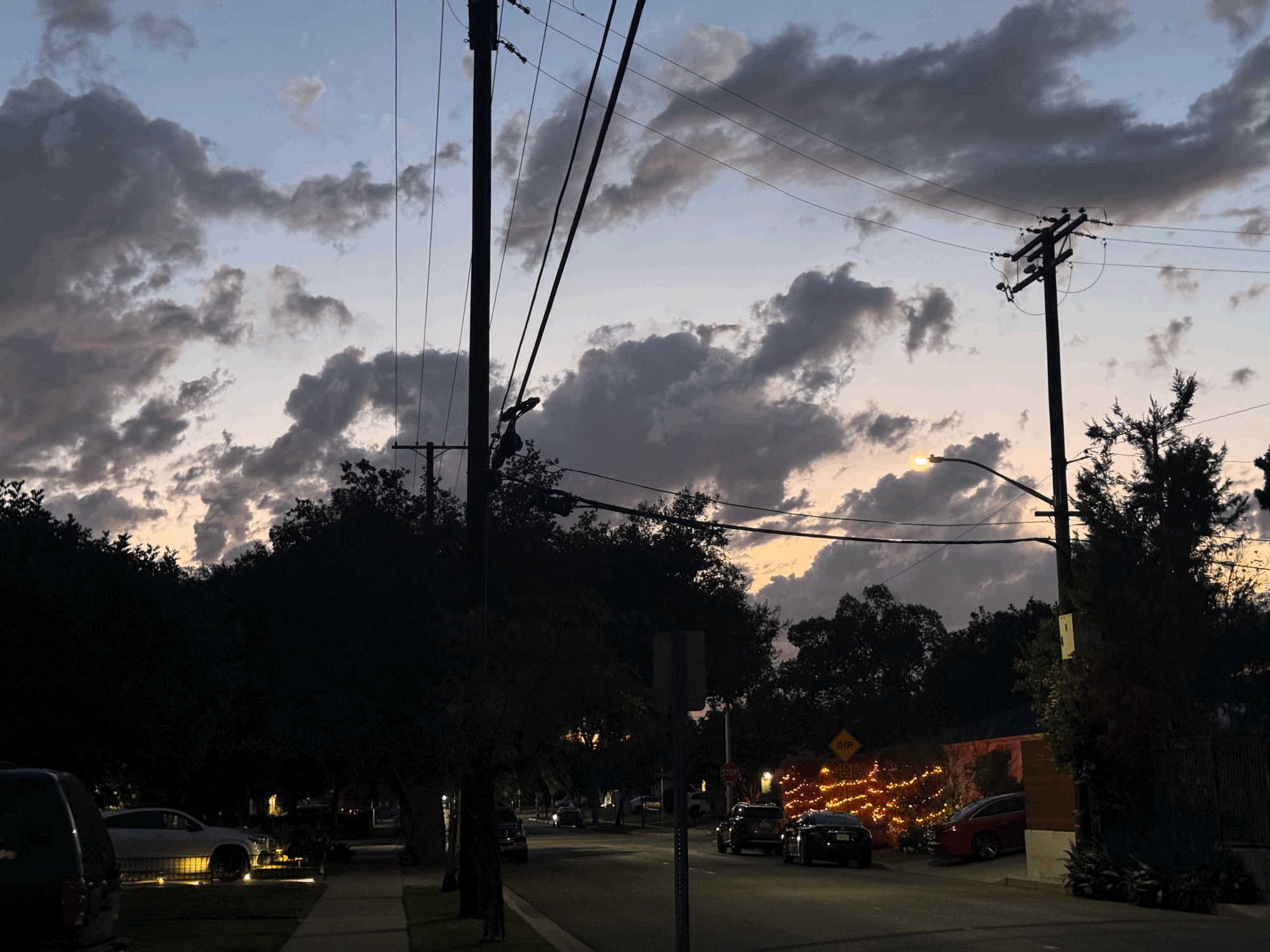 Suburban street at dusk. This is where the people live.